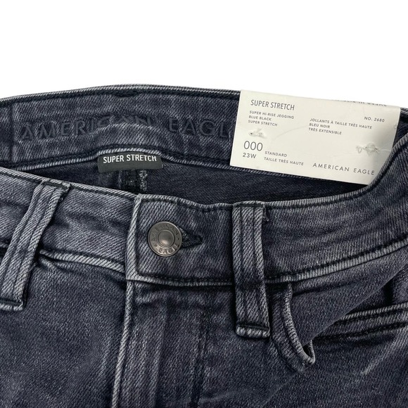 NWT AMERICAN EAGLE Super Hi-Rise Jegging Destroyed Hem Sz 000 Blue Black - Picture 3 of 7